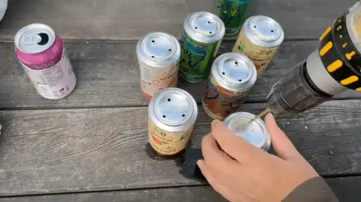 Use Old Cans For Drainage In Your Garden